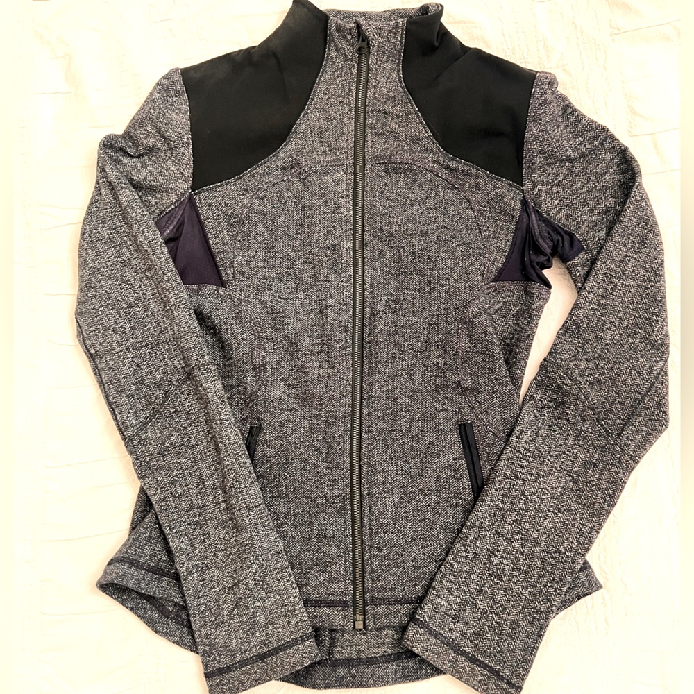 Fitted Lulu lemon zip up sweater.  Size 10 but fits more like a 6 or 8.
